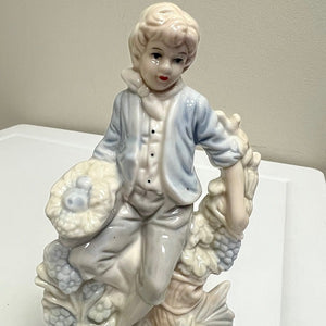Porcelain Boy Figurine Soft Blue 7 inch