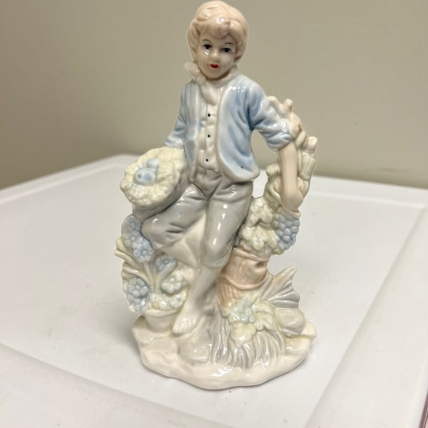 Porcelain Boy Figurine Soft Blue 7 inch