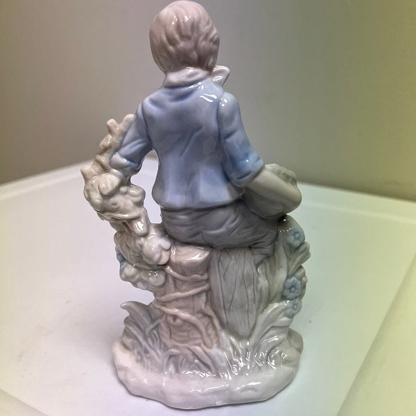 Porcelain Boy Figurine Soft Blue 7 inch