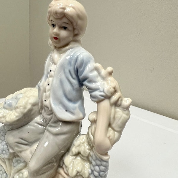 Porcelain Boy Figurine Soft Blue 7 inch