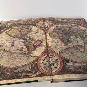Open book with a detailed world map on a white background