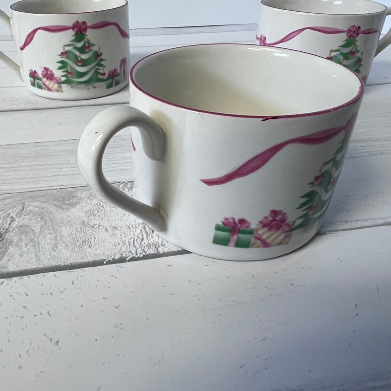 Ceramic mug with decorative design on a white surface