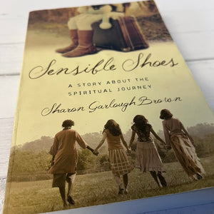 Book titled 'Sensible Shoes' by Sharon Garloch Brown on a wooden surface