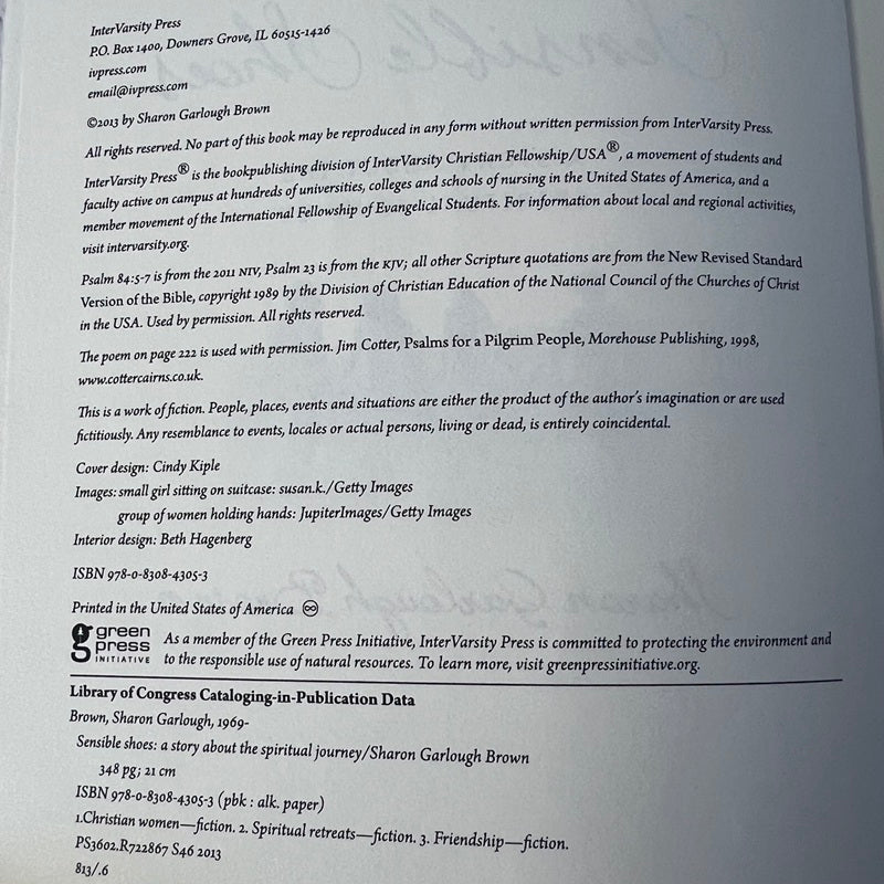 Back cover of a book with text, including copyright information and bibliographic details.