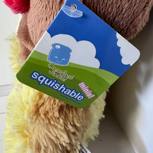Plush toy with a Squishable minis tag on a white background