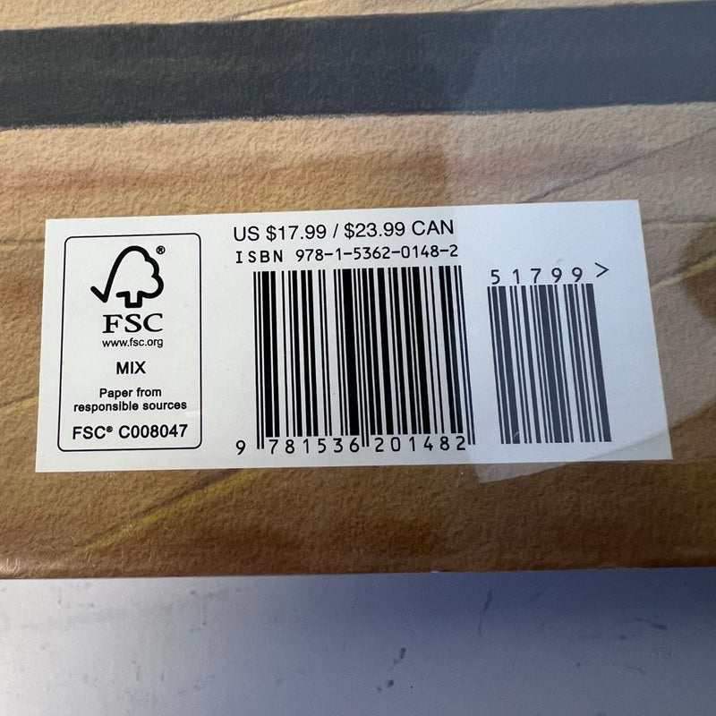 FSC label with barcode on a cardboard surface