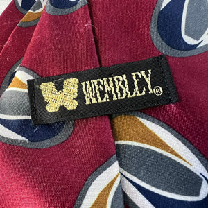 Close-up of a patterned fabric with a 'Wembley' label.
