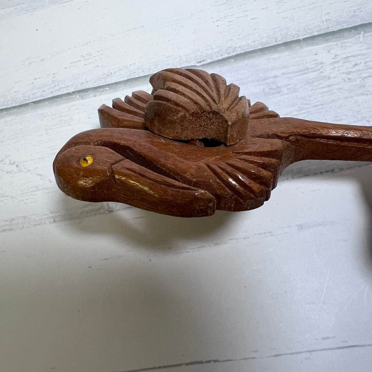 Vintage hand-carved wooden flamingo brooch dating to the 1940s