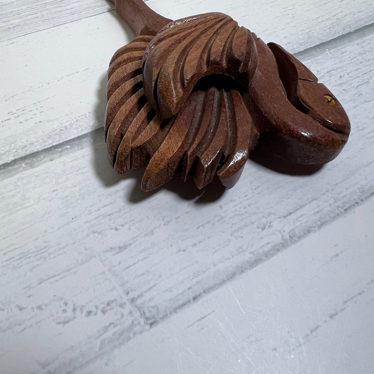 Vintage hand-carved wooden flamingo brooch dating to the 1940s