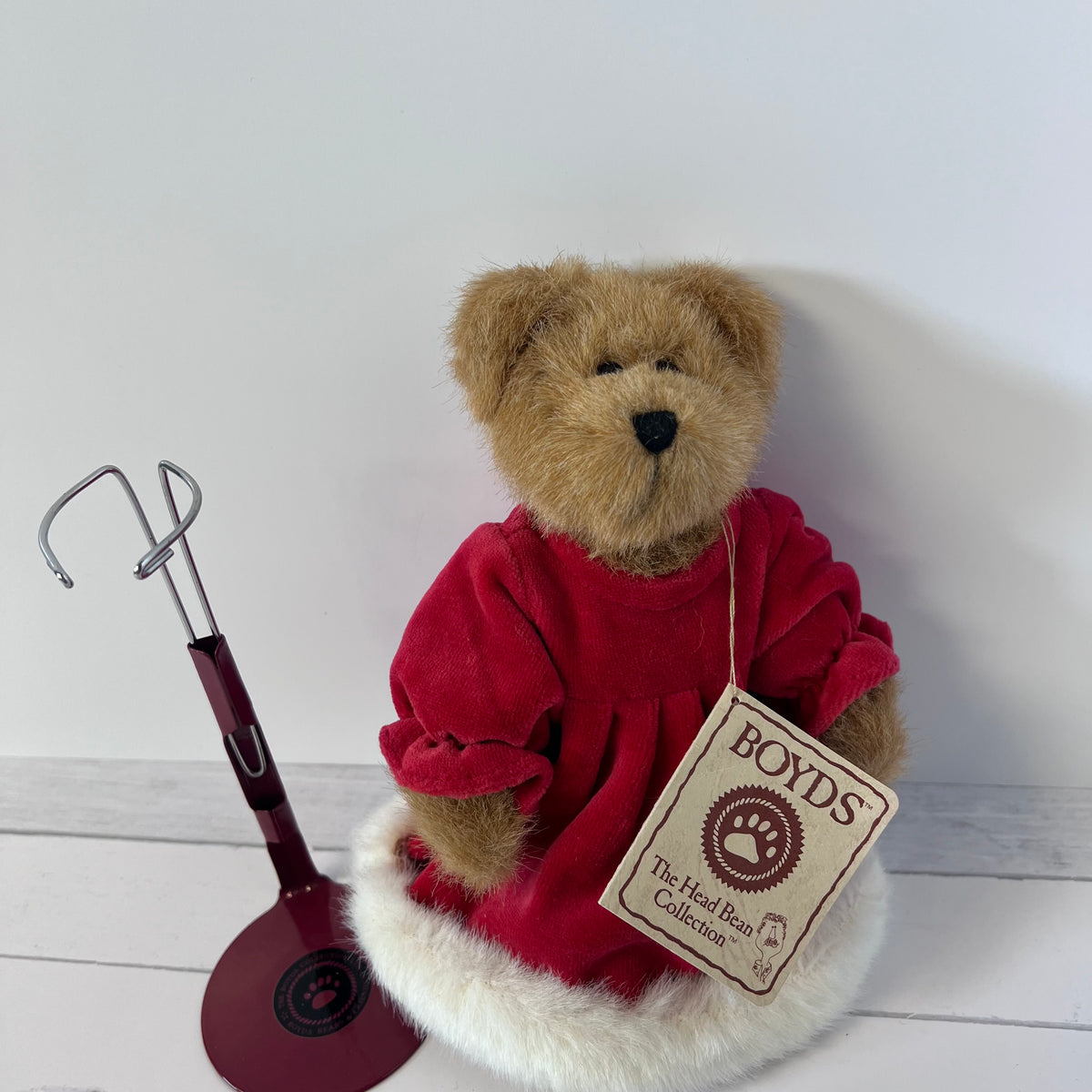 collectible bear with doll stand