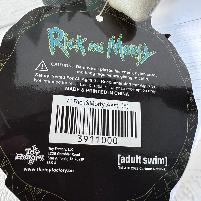 Back of a toy packaging with 'Rick and Morty' branding and product details.