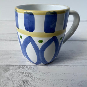 white coffee mug retired pattern