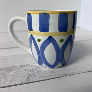 coffee mug with blue green yellow