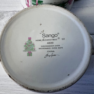 Sango product label on a ceramic dish with a Christmas tree design.