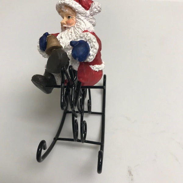 Christmas Santa Claus Riding On Rocking Horse Decoration