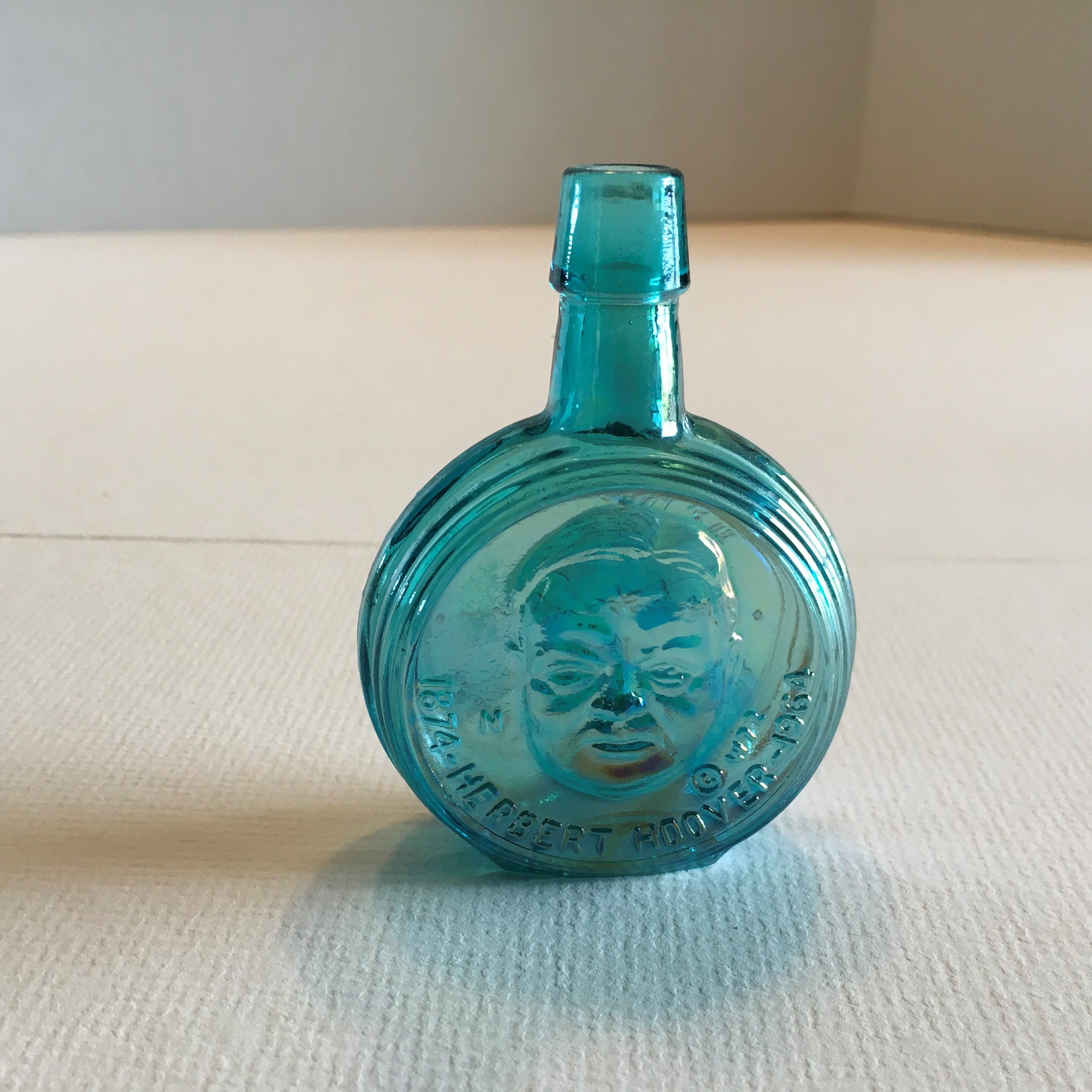 Herbert Hoover Mini Blue Carnival Glass Bottle