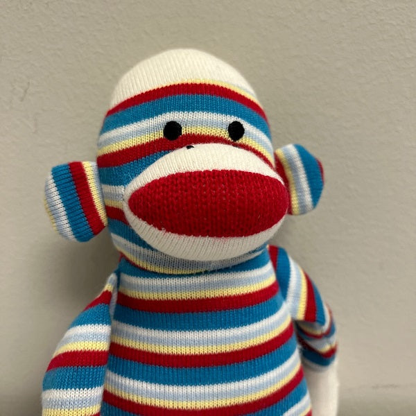 Sock Monkey 12 inch Knitted Plush by Aurora. Colorful Red Yellow Blue White