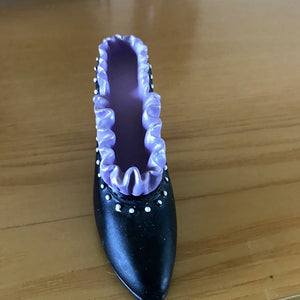 Black and purple resin decorative shoe