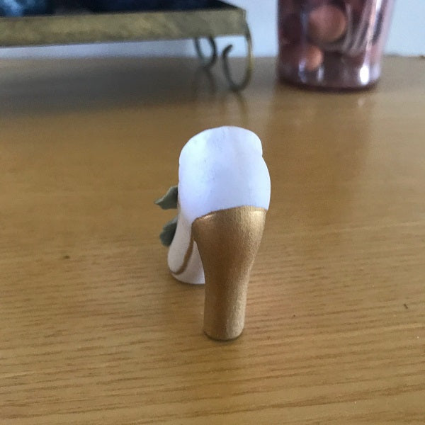 collectible shoe gold heel