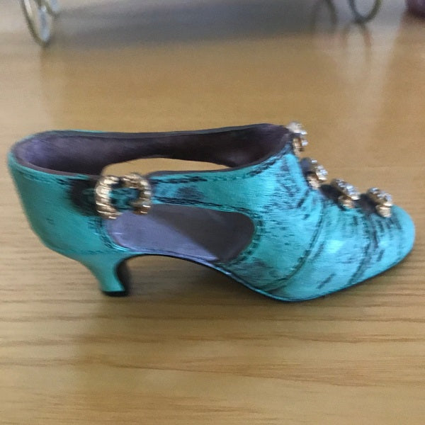 Green miniature shoe collectible 