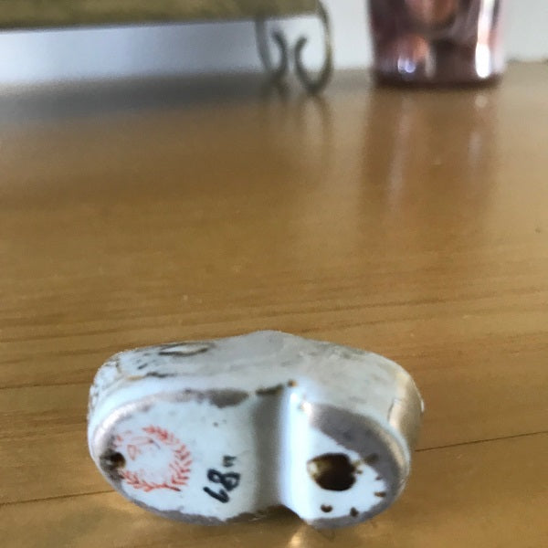 miniature porcelain shoe bottom view