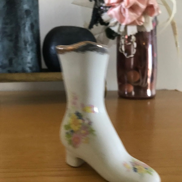 white ceramic boot