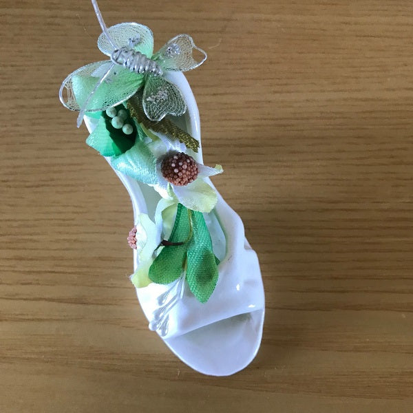white porcelain miniature shoe with flowers
