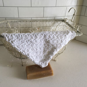 crocheted white washcloth